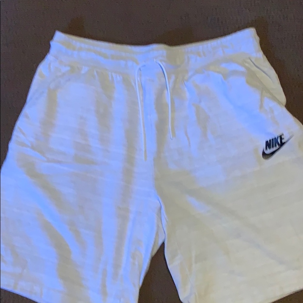 White Nike shorts